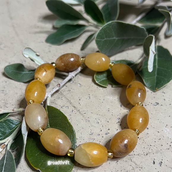 Natural Yellow Golden Lace Silk Jade
Lucky Money Barrel Bracelet - Picture 1 of 5